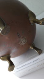 Vintage copper and brass footed vessel