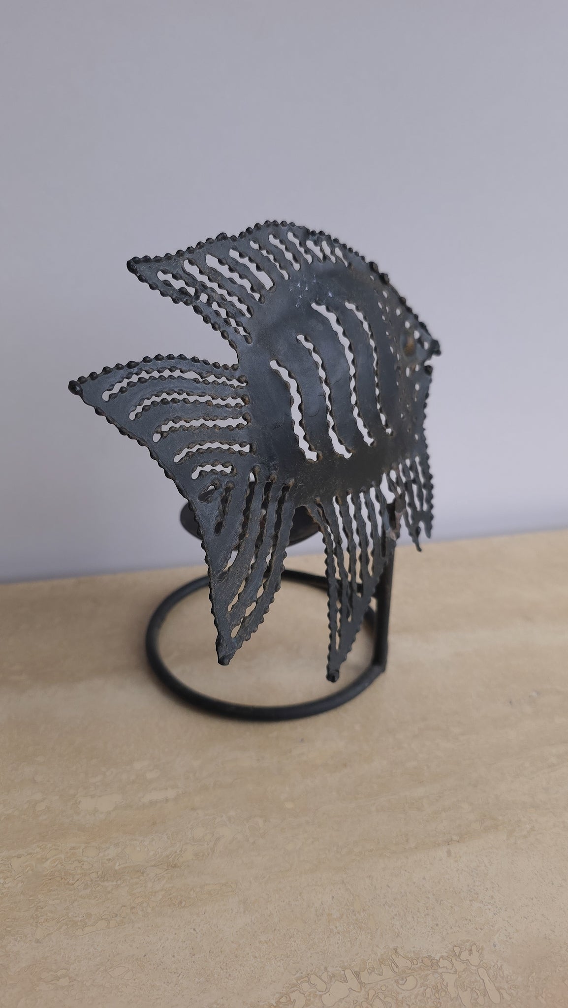 Sculptural metal fish tealight holder