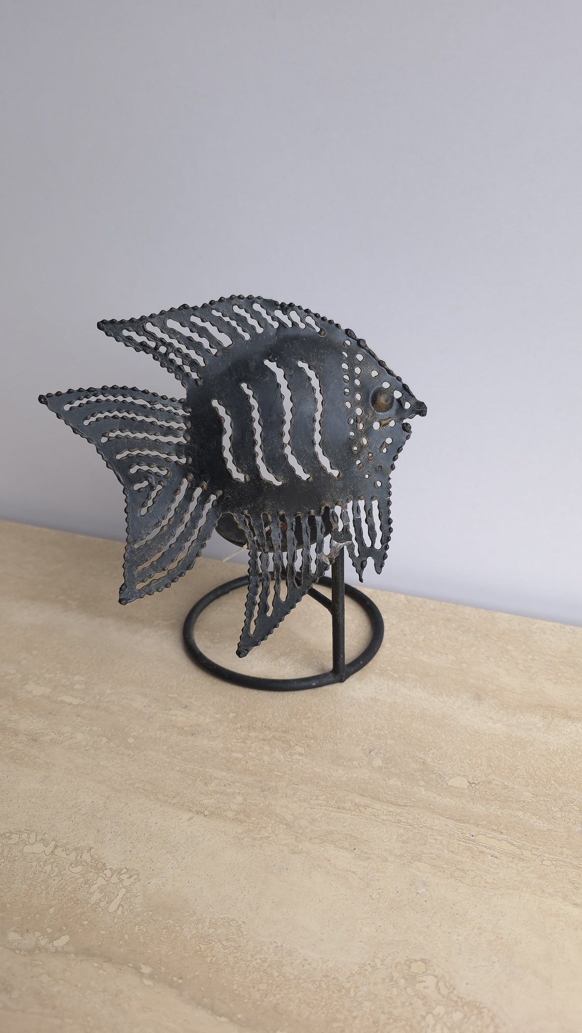 Sculptural metal fish tealight holder