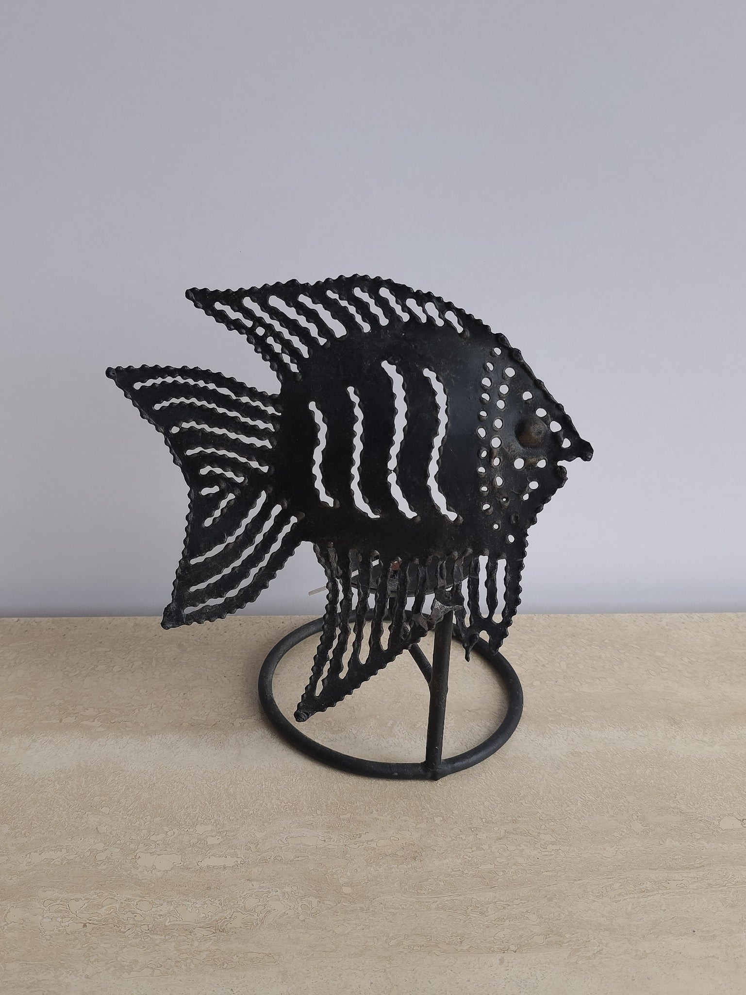 Sculptural metal fish tealight holder