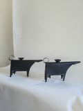 Sculptural metal cow candle holders