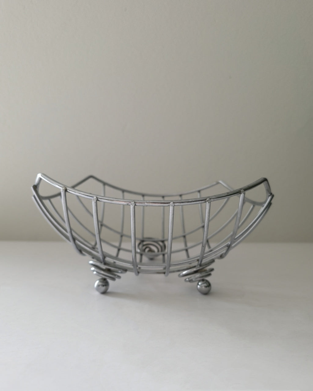 Chrome Fruit Basket with spiral coil and ball feet