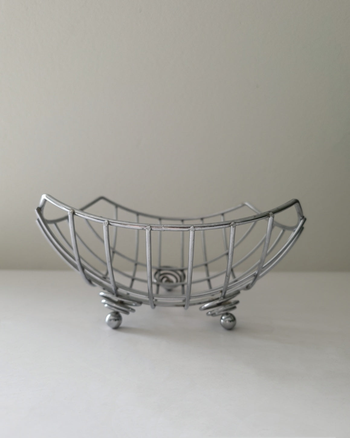 Chrome Fruit Basket with spiral coil and ball feet